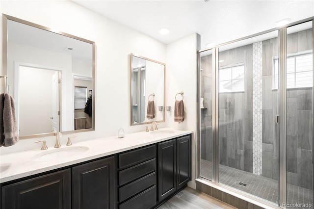 14454 Grape Way, Thornton, CO 80602 - full bath with double vanity and a stall shower