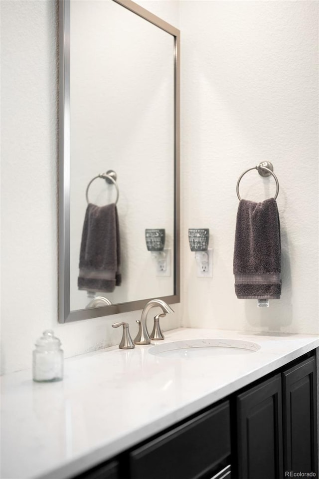 14454 Grape Way, Thornton, CO 80602 - bathroom featuring vanity