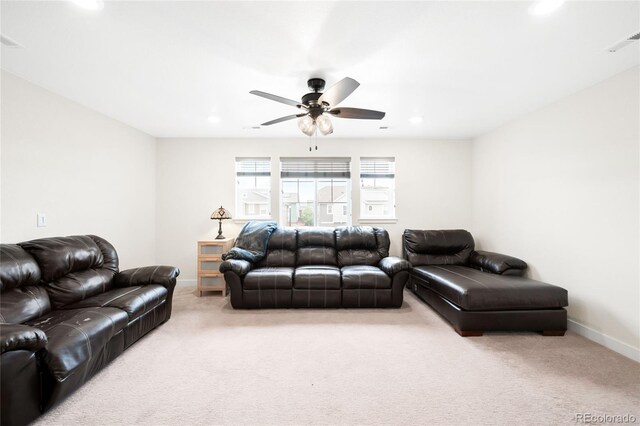14454 Grape Way, Thornton, CO 80602 - living room with light colored carpet, baseboards, a ceiling fan, and recessed lighting