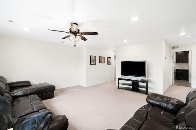 14454 Grape Way, Thornton, CO 80602 - living area with a ceiling fan, baseboards, light colored carpet, and recessed lighting