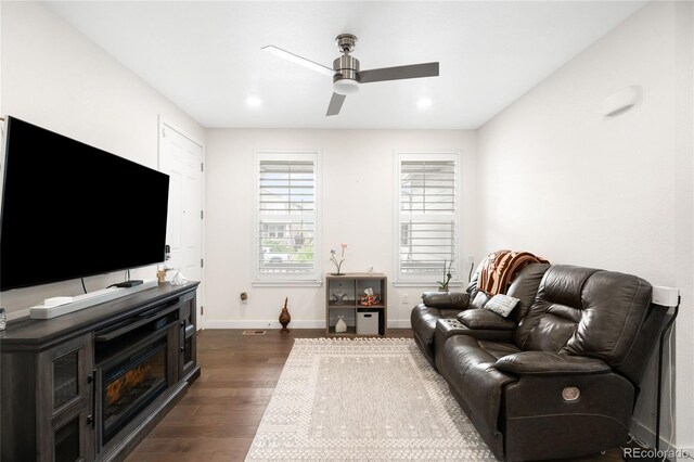 14454 Grape Way, Thornton, CO 80602 - living area featuring dark wood-type flooring, a ceiling fan, baseboards, and recessed lighting