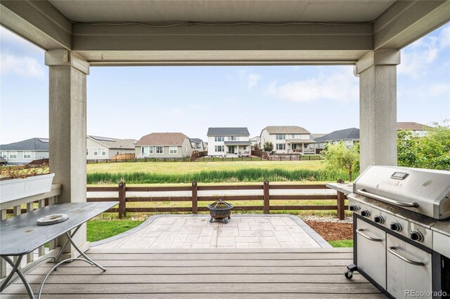 14454 Grape Way, Thornton, CO 80602 - wooden deck with a residential view and area for grilling