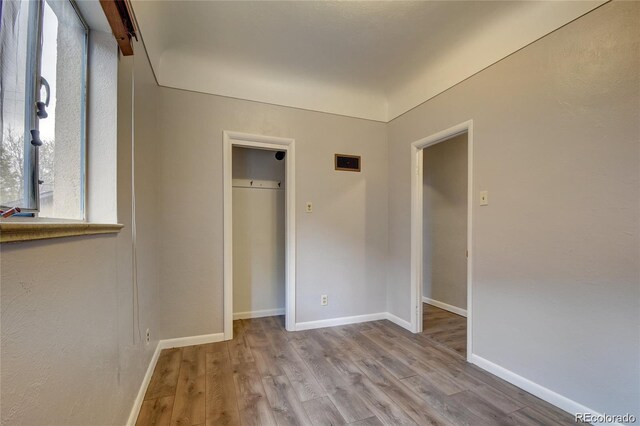 4514 Bryant St, Denver, CO 80211 - unfurnished bedroom featuring wood finished floors and baseboards