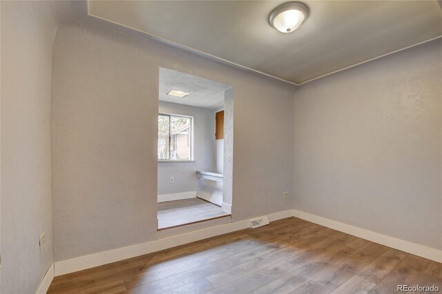 4514 Bryant St, Denver, CO 80211 - empty room with hardwood / wood-style flooring and baseboards