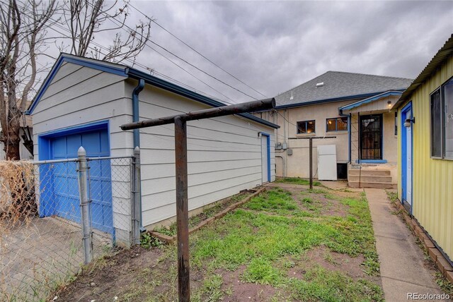 4514 Bryant St, Denver, CO 80211 - view of side of home featuring fence and a gate