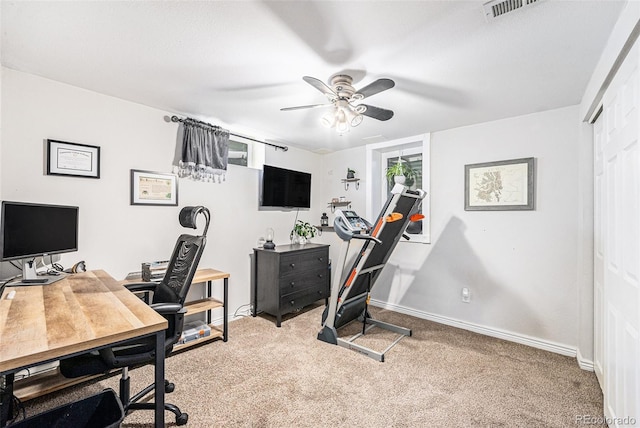 carpeted office with ceiling fan