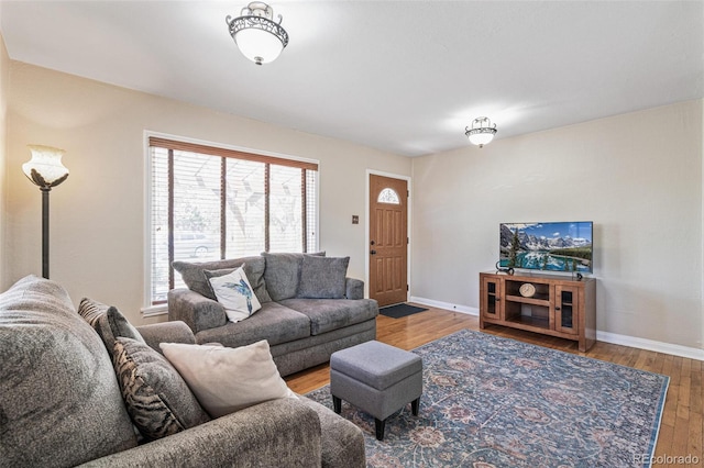 2252 Lamar St, Edgewater, CO 80214 - living area featuring baseboards and wood finished floors