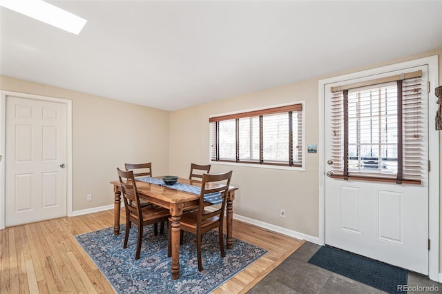 2252 Lamar St, Edgewater, CO 80214 - dining space with baseboards and light wood finished floors