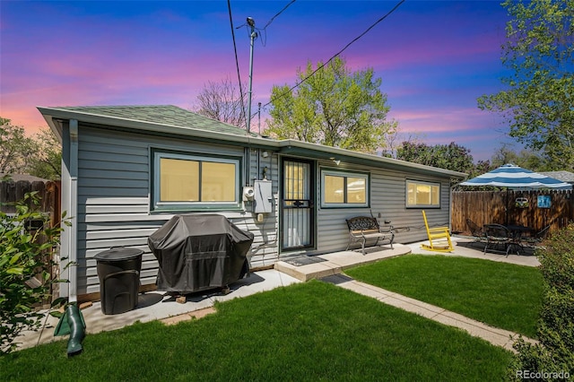 2252 Lamar St, Edgewater, CO 80214 - rear view of property featuring a patio and roof with shingles