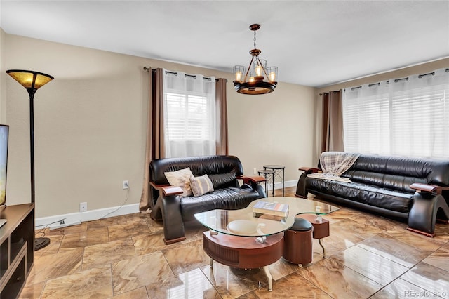 living room featuring an inviting chandelier