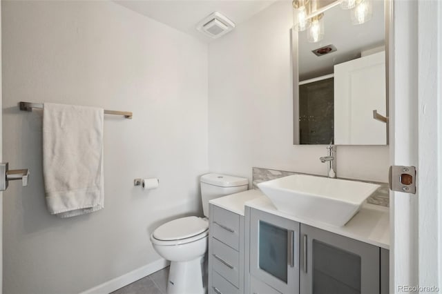 540 S Forest St Unit 3-204, Denver, CO 80246 - full bath with tile patterned flooring, a shower, baseboards, vanity, and toilet