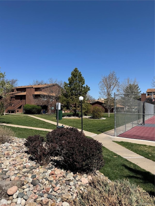 540 S Forest St Unit 3-204, Denver, CO 80246 - view of community featuring fence and a yard