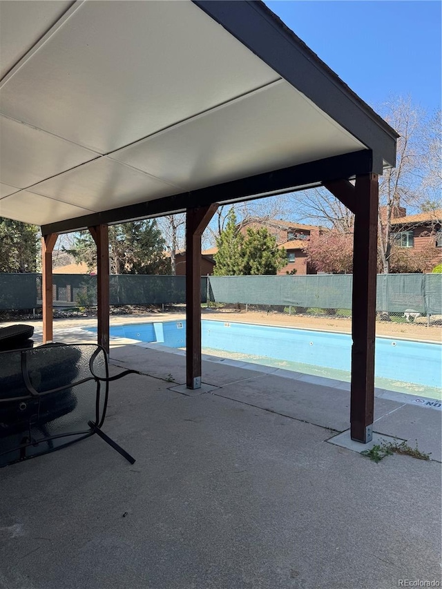 540 S Forest St Unit 3-204, Denver, CO 80246 - view of pool with a fenced in pool, a fenced backyard, and a patio