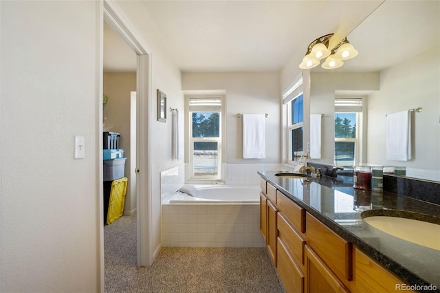 17950 Cumbres Rd, Peyton, CO 80831 - full bathroom with a garden tub and double vanity