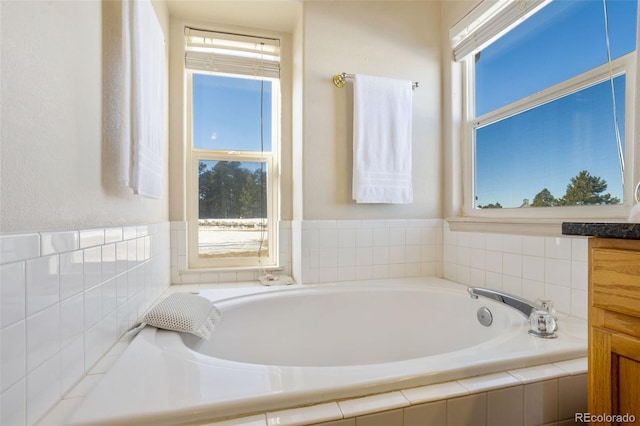 17950 Cumbres Rd, Peyton, CO 80831 - full bath featuring a bath, plenty of natural light, and vanity