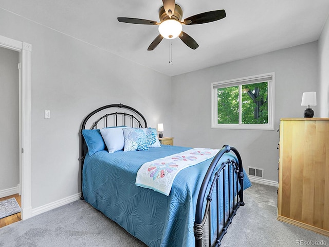 6810 S Marion Cir W, Centennial, CO 80122 - carpeted bedroom featuring baseboards and ceiling fan