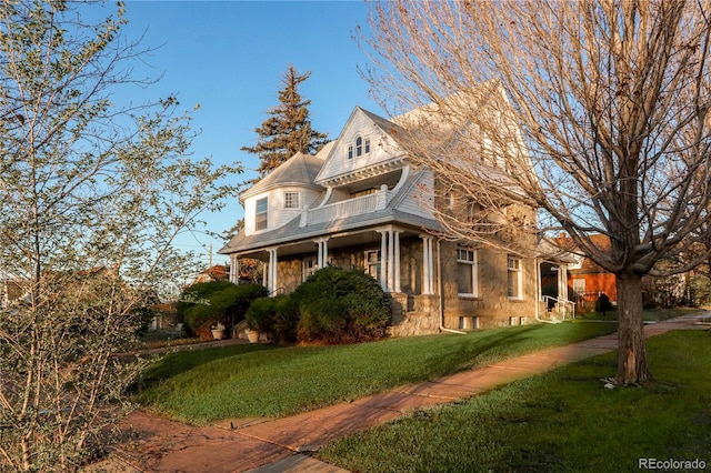 view of home's exterior featuring a yard