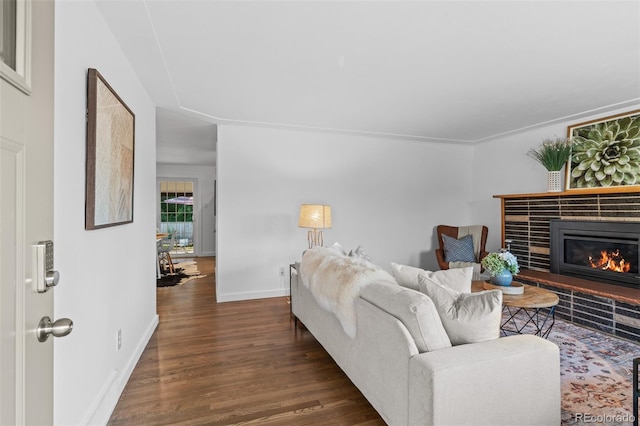 4100 Shaw Blvd, Westminster, CO 80031 - living area featuring dark wood-style flooring and a tile fireplace