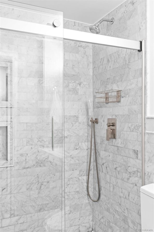 4100 Shaw Blvd, Westminster, CO 80031 - bathroom with a marble finish shower and toilet