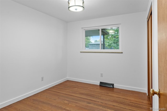 4100 Shaw Blvd, Westminster, CO 80031 - unfurnished bedroom featuring wood finished floors and a closet