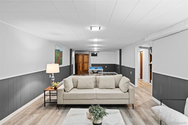 4100 Shaw Blvd, Westminster, CO 80031 - living area with wainscoting, wood finished floors, and wooden walls