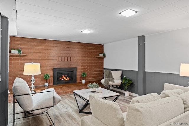 4100 Shaw Blvd, Westminster, CO 80031 - living area with wood finished floors, a fireplace, and wainscoting