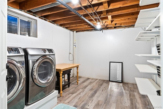 4100 Shaw Blvd, Westminster, CO 80031 - laundry area featuring washing machine and dryer and light wood-style floors