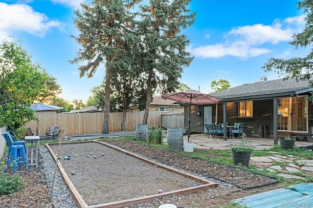 4100 Shaw Blvd, Westminster, CO 80031 - view of yard with a game area and a patio