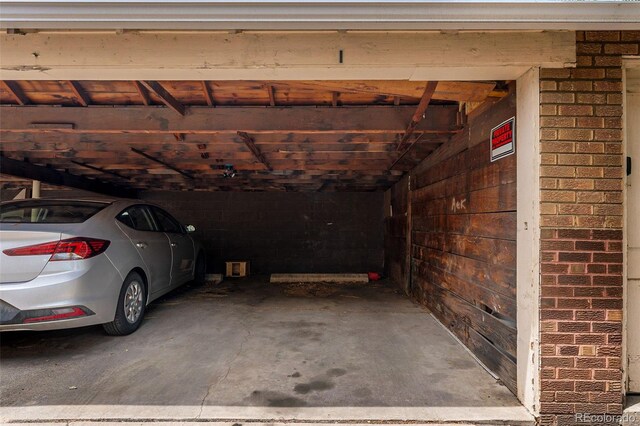 1535 Hudson St Unit 1, Denver, CO 80220 - garage with wood walls