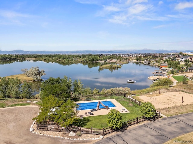 birds eye view of property featuring a water view