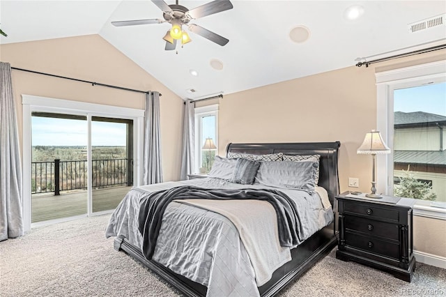 carpeted bedroom with vaulted ceiling, access to outside, and ceiling fan