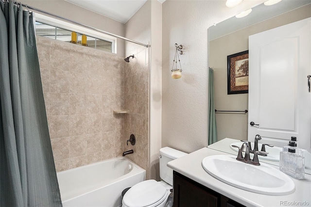 6173 Eldora St, Golden, CO 80403 - bathroom with toilet, shower / bath combo, vanity, and a textured wall