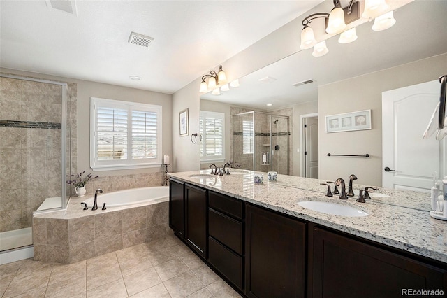 6173 Eldora St, Golden, CO 80403 - bathroom with a shower stall, a garden tub, tile patterned floors, and double vanity