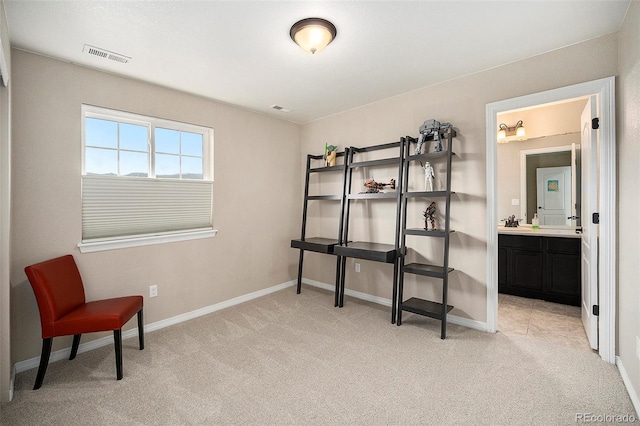 6173 Eldora St, Golden, CO 80403 - bedroom featuring light colored carpet, a sink, baseboards, and ensuite bath
