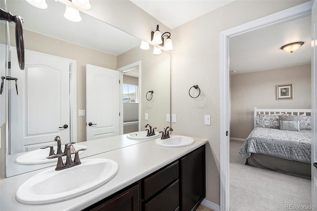 6173 Eldora St, Golden, CO 80403 - full bathroom with double vanity and connected bathroom