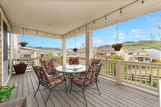 6173 Eldora St, Golden, CO 80403 - deck with a residential view and outdoor dining space