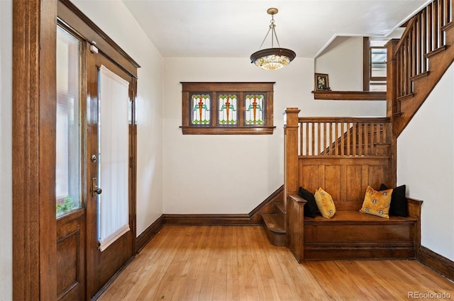 1430 Monroe St, Denver, CO 80206 - foyer entrance featuring wood-type flooring, baseboards, and stairs
