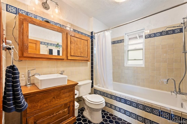 1430 Monroe St, Denver, CO 80206 - bathroom with tile walls, tiled shower / bath combo, toilet, vanity, and a textured ceiling