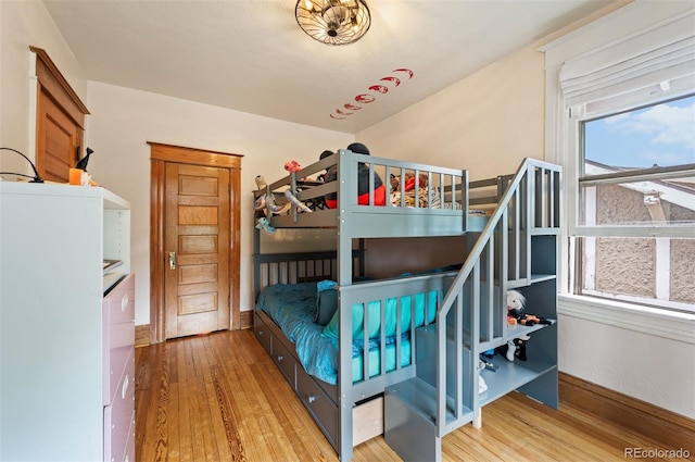 1430 Monroe St, Denver, CO 80206 - bedroom featuring wood-type flooring and baseboards