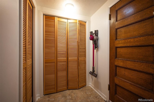 1430 Monroe St, Denver, CO 80206 - detailed view of baseboards and unfinished concrete floors