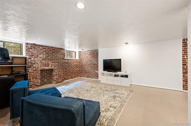 1430 Monroe St, Denver, CO 80206 - living area with brick wall and baseboards