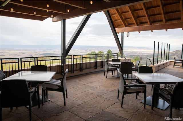 view of patio / terrace featuring a mountain view