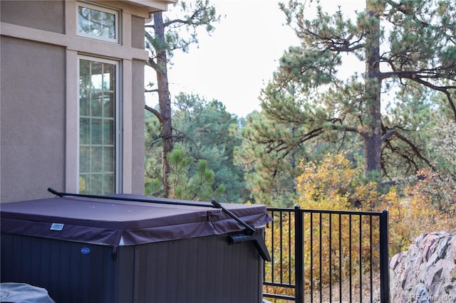 exterior space featuring a hot tub