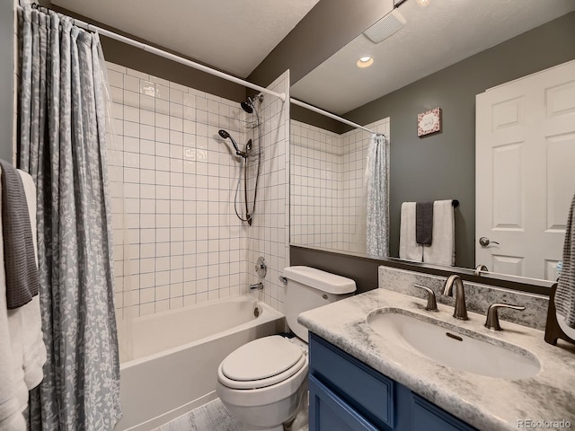 full bath featuring visible vents, vanity, shower / bath combination with curtain, and toilet