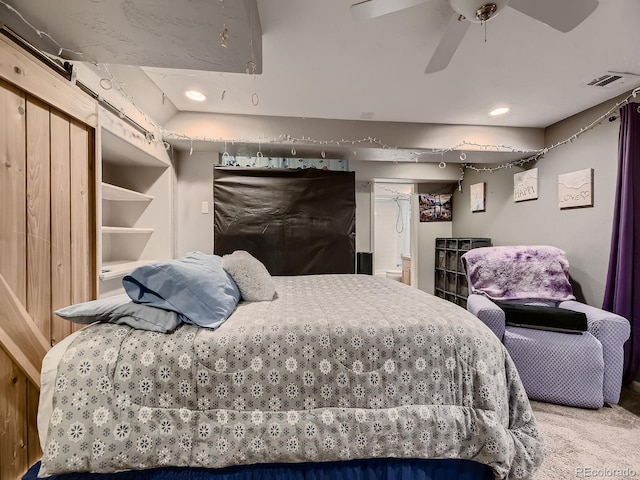 carpeted bedroom featuring visible vents and ceiling fan