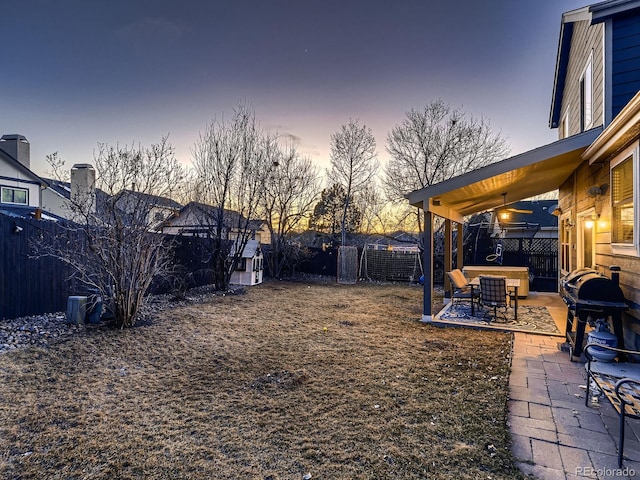 view of yard featuring a fenced backyard and a patio