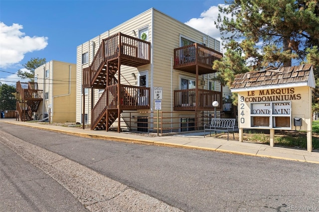 9240 W 49th Ave Unit 317, Wheat Ridge, CO 80033 - view of building exterior with stairs