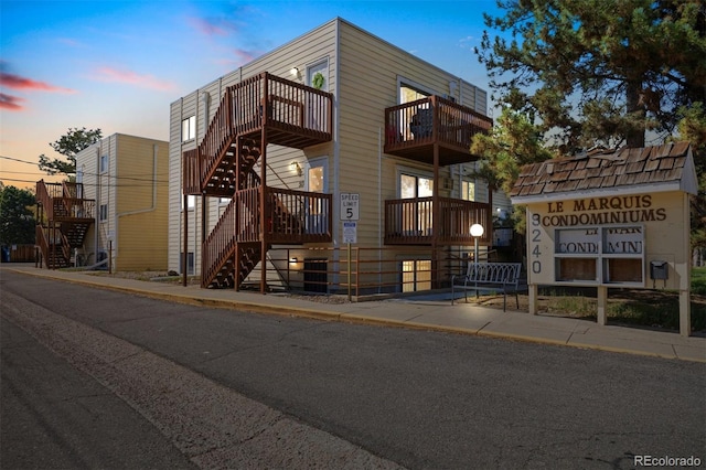 9240 W 49th Ave Unit 317, Wheat Ridge, CO 80033 - property at dusk featuring stairway