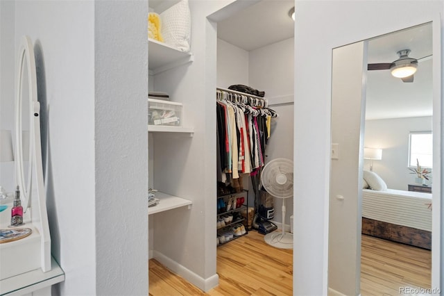 9240 W 49th Ave Unit 317, Wheat Ridge, CO 80033 - walk in closet with wood finished floors