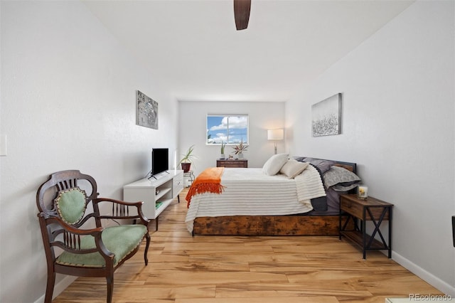 9240 W 49th Ave Unit 317, Wheat Ridge, CO 80033 - bedroom featuring light wood-style flooring and ceiling fan